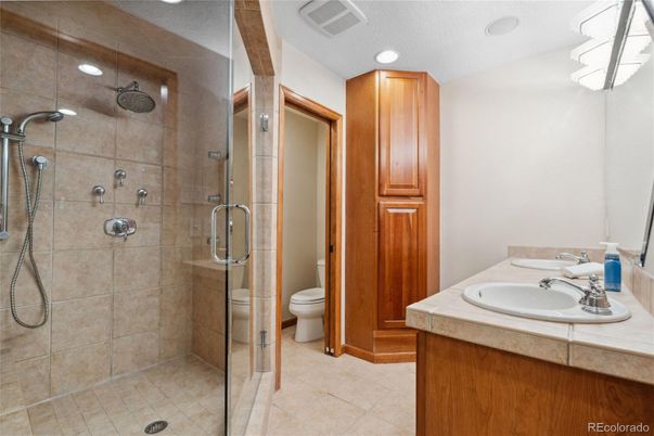 Bathroom, Glass Shower, Interior, Recessed Lighting, Tile Countertops