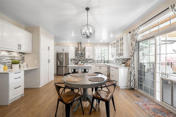 Dining room, Interior, Kitchen, Pendant Lights, Recessed Lighting, Stainless Steel Appliances, Wood Texture Flooring