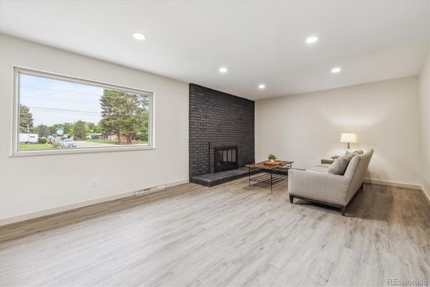 Fireplace, Interior, Recessed Lighting, Stone Walls, Wood Texture Flooring