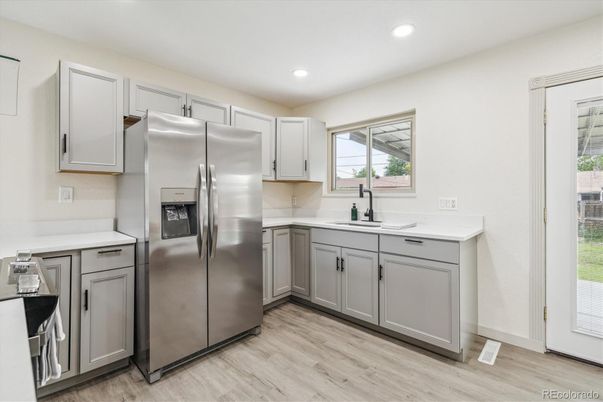 Interior, Kitchen, Recessed Lighting, Stainless Steel Appliances, Wood Texture Flooring