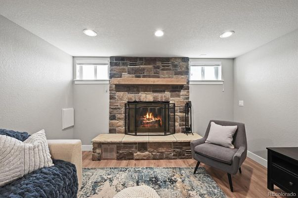 Fireplace, Interior, Recessed Lighting, Stone Walls, Wood Texture Flooring