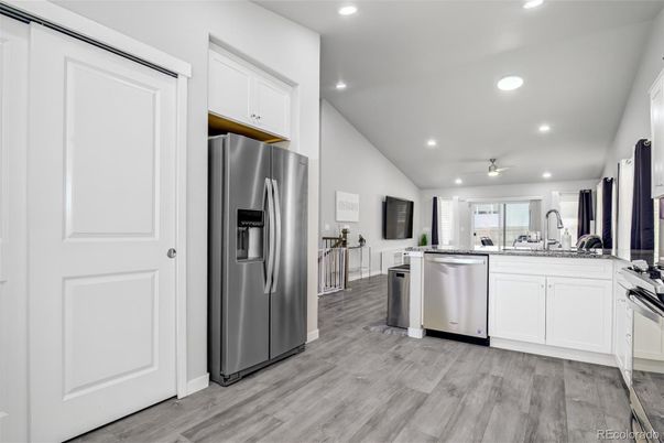 Interior, Kitchen, Recessed Lighting, Stainless Steel Appliances, Wood Texture Flooring