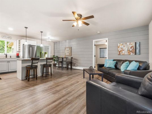 Dining room, Interior, Kitchen, Living room, Pendant Lights, Recessed Lighting, Stainless Steel Appliances, Wood Texture Flooring