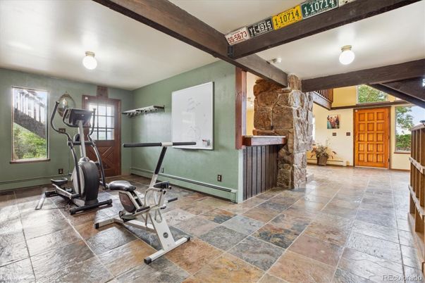 Fitness Equipment, Interior, Stone Walls, Wooden Beams