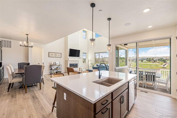 Chandelier, Dining room, Fireplace, Interior, Kitchen, Living room, Pendant Lights, Recessed Lighting, Wood Texture Flooring