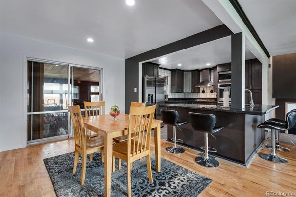 Dining room, Interior, Kitchen, Recessed Lighting, Stainless Steel Appliances, Wood Texture Flooring