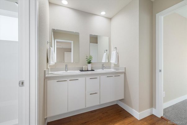 Bathroom, Dual Sink Vanities, Interior, Recessed Lighting, Wood Texture Flooring