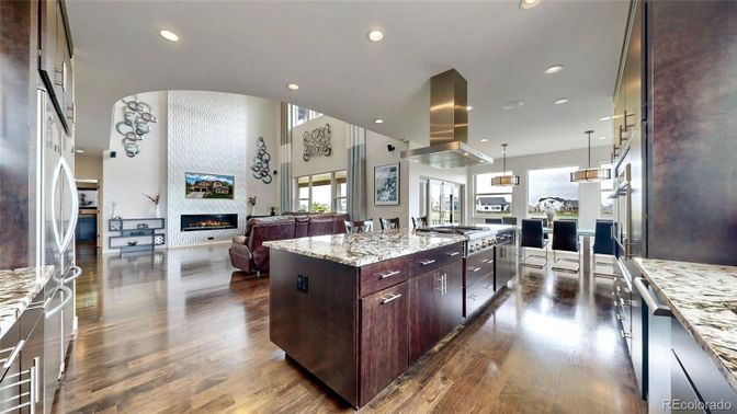 Fireplace, Interior, Kitchen, Living room, Pendant Lights, Recessed Lighting, Stainless Steel Appliances, Wood Texture Flooring