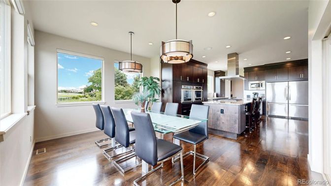 Dining room, Interior, Kitchen, Pendant Lights, Recessed Lighting, Stainless Steel Appliances, Wood Texture Flooring