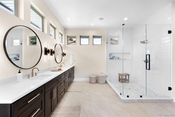 Bathroom, Dual Sink Vanities, Glass Shower, Interior, Recessed Lighting, Wood Texture Flooring