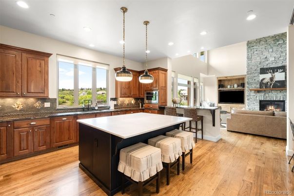 Fireplace, Interior, Kitchen, Living room, Pendant Lights, Recessed Lighting, Stone Walls, Wood Texture Flooring