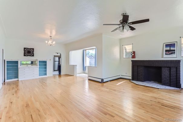 Chandelier, Empty room, Fireplace, Interior, Wood Texture Flooring