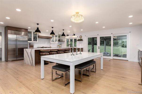 Dining room, Interior, Kitchen, Pendant Lights, Recessed Lighting, Stainless Steel Appliances, Wood Texture Flooring