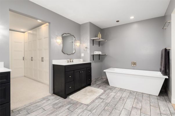 Bathroom, Dual Sink Vanities, Free Standing Baths, Interior, Recessed Lighting, Wood Texture Flooring