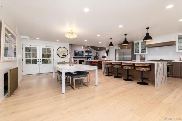Chandelier, Dining room, Interior, Kitchen, Pendant Lights, Recessed Lighting, Stainless Steel Appliances, Wood Texture Flooring