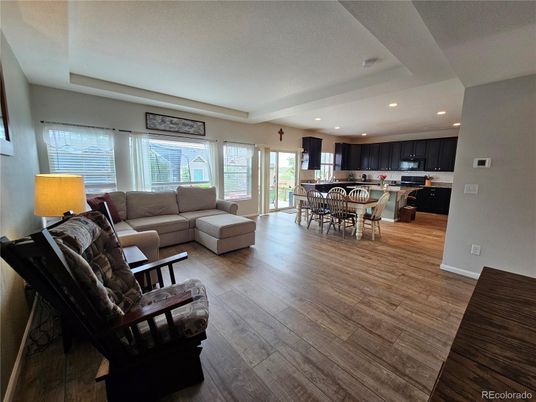 Dining room, Interior, Kitchen, Living room, Recessed Lighting, Stainless Steel Appliances, Wood Texture Flooring