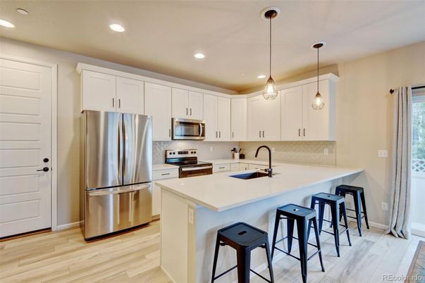 Interior, Kitchen, Pendant Lights, Recessed Lighting, Stainless Steel Appliances, Wood Texture Flooring