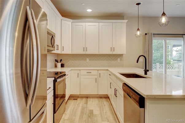 Interior, Kitchen, Pendant Lights, Recessed Lighting, Stainless Steel Appliances, Wood Texture Flooring
