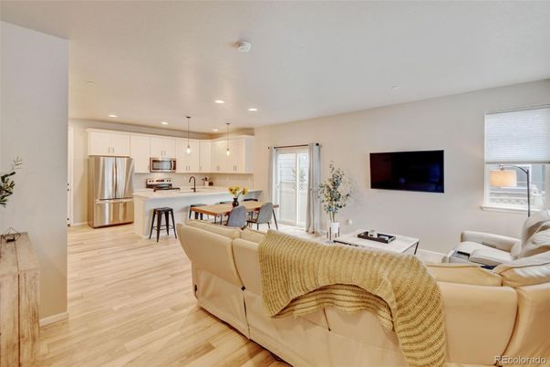 Dining room, Interior, Kitchen, Living room, Pendant Lights, Recessed Lighting, Stainless Steel Appliances, Wood Texture Flooring