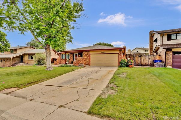 Attached, Backyard, Exterior, Facade, Brick Facade, Split Level
