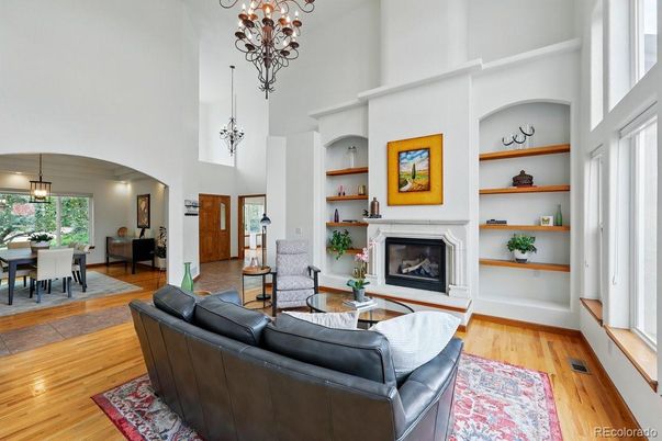 Chandelier, Dining room, Fireplace, Interior, Living room, Pendant Lights, Wood Texture Flooring