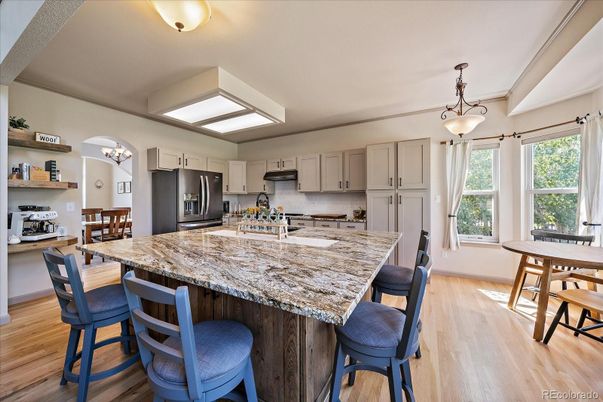 Dining room, Interior, Kitchen, Pendant Lights, Stainless Steel Appliances, Wood Texture Flooring