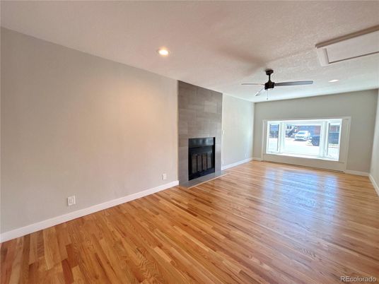 Empty room, Fireplace, Interior, Recessed Lighting, Wood Texture Flooring