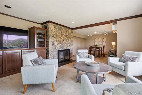 Dining room, Fireplace, Interior, Living room, Recessed Lighting, Stone Walls