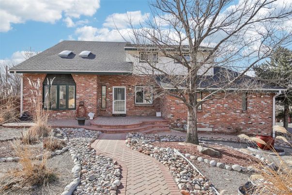 Exterior, Facade, Brick Facade, Log Home