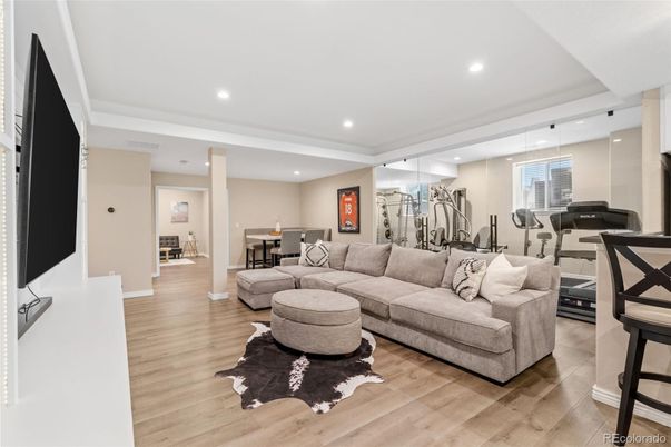 Dining room, Fitness Equipment, Interior, Living room, Recessed Lighting, Wood Texture Flooring