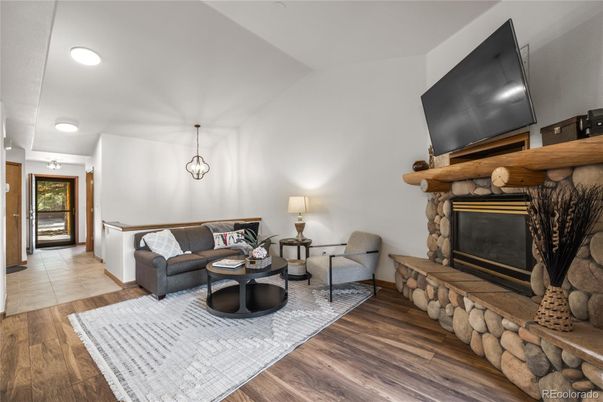Fireplace, Interior, Living room, Pendant Lights, Recessed Lighting, Wood Texture Flooring
