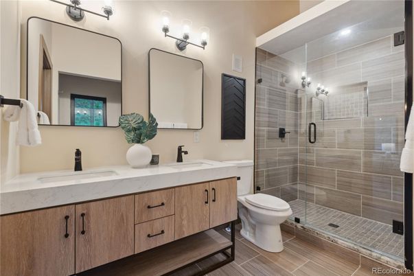 Bathroom, Dual Sink Vanities, Glass Shower, Interior, Wood Texture Flooring