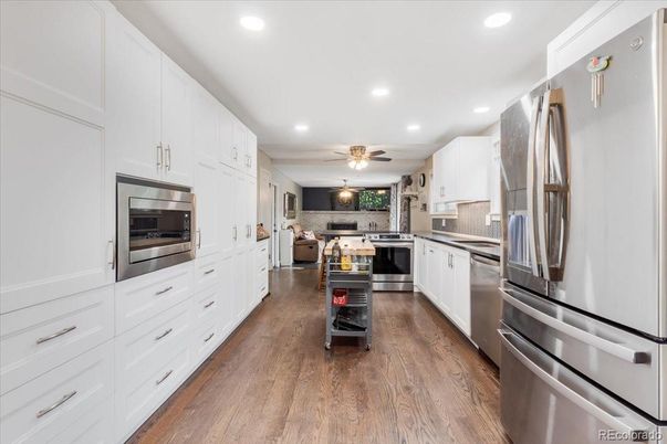 Interior, Kitchen, Recessed Lighting, Stainless Steel Appliances, Wood Texture Flooring