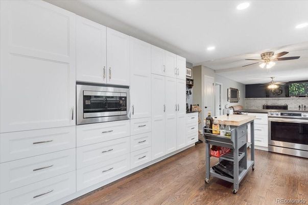 Interior, Kitchen, Recessed Lighting, Stainless Steel Appliances, Wood Texture Flooring