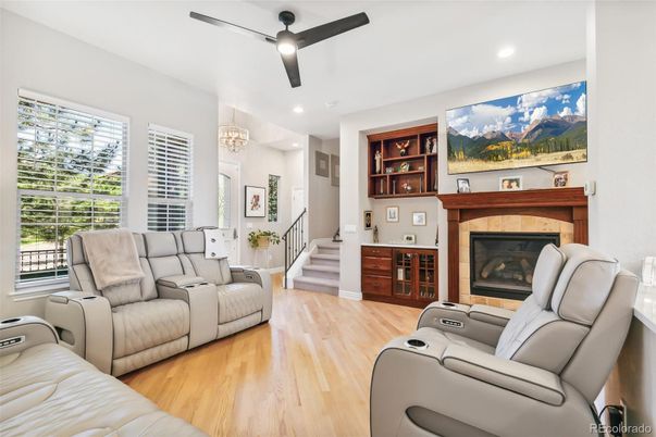 Chandelier, Home Theatre Room, Fireplace, Interior, Living room, Recessed Lighting, Wood Texture Flooring
