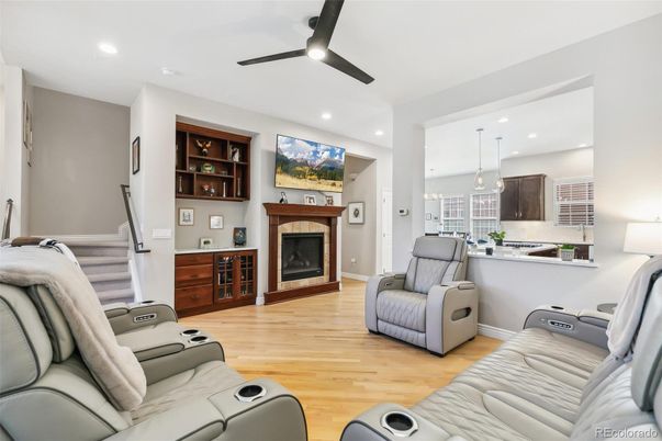 Home Theatre Room, Fireplace, Interior, Living room, Pendant Lights, Recessed Lighting, Wood Texture Flooring