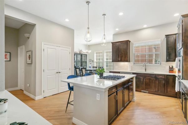 Chandelier, Interior, Kitchen, Pendant Lights, Recessed Lighting, Stainless Steel Appliances, Wood Texture Flooring