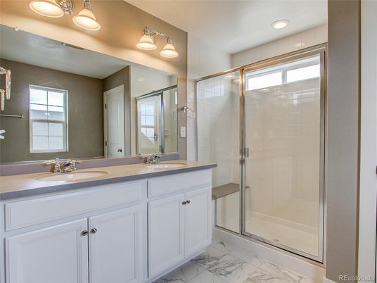 Bathroom, Dual Sink Vanities, Glass Shower, Interior, Marble, Recessed Lighting