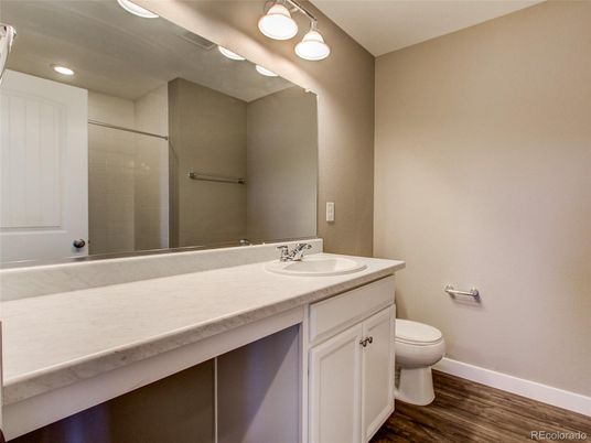 Bathroom, Dual Sink Vanities, Interior, Recessed Lighting, Wood Texture Flooring
