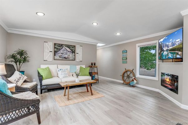 Fireplace, Interior, Living room, Recessed Lighting, Wood Texture Flooring