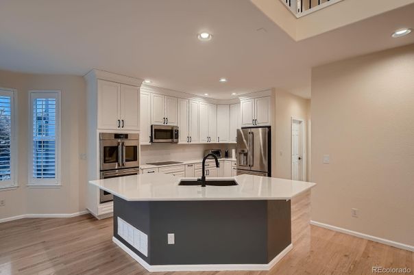 Interior, Kitchen, Recessed Lighting, Stainless Steel Appliances, Wood Texture Flooring