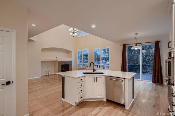 Chandelier, Fireplace, Interior, Kitchen, Pendant Lights, Recessed Lighting, Wood Texture Flooring