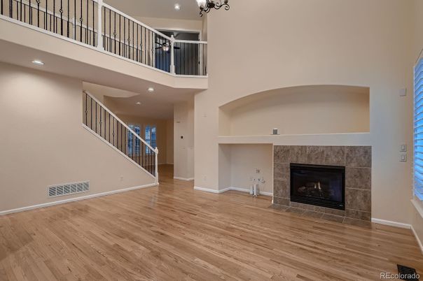 Fireplace, Interior, Pendant Lights, Recessed Lighting, Wood Texture Flooring