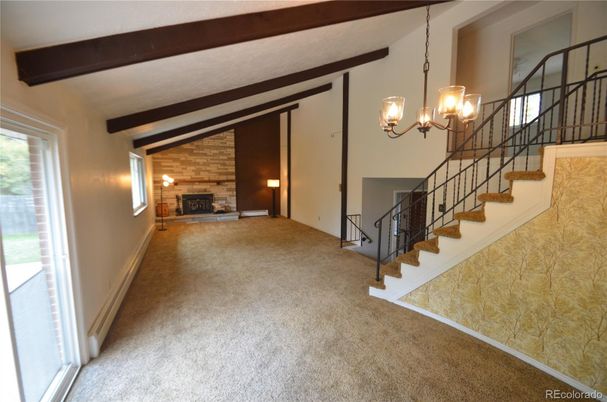 Chandelier, Empty room, Fireplace, Interior, Wooden Beams