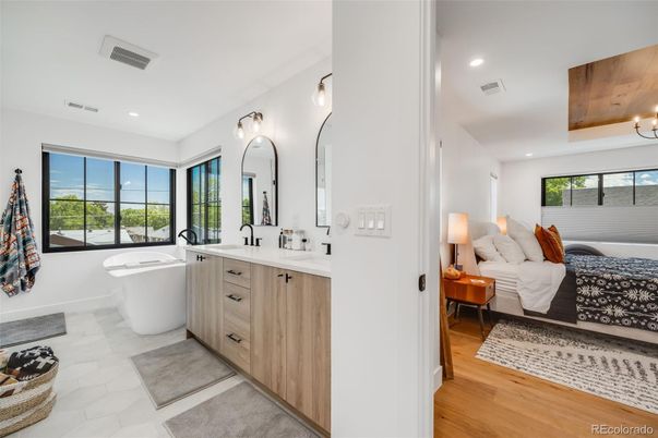 Bathroom, Bedroom, Dual Sink Vanities, Free Standing Baths, Interior, Recessed Lighting, Wood Texture Flooring