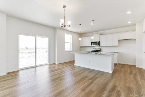 Chandelier, Interior, Kitchen, Pendant Lights, Recessed Lighting, Stainless Steel Appliances, Wood Texture Flooring