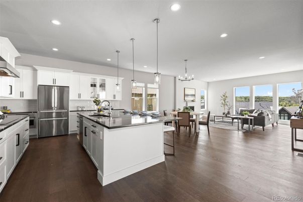 Chandelier, Dining room, Interior, Kitchen, Pendant Lights, Recessed Lighting, Stainless Steel Appliances, Wood Texture Flooring