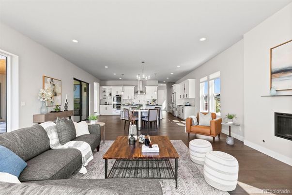 Dining room, Fireplace, Interior, Kitchen, Living room, Pendant Lights, Recessed Lighting, Stainless Steel Appliances, Wood Texture Flooring