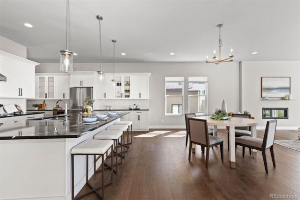 Dining room, Interior, Kitchen, Pendant Lights, Recessed Lighting, Stainless Steel Appliances, Wood Texture Flooring