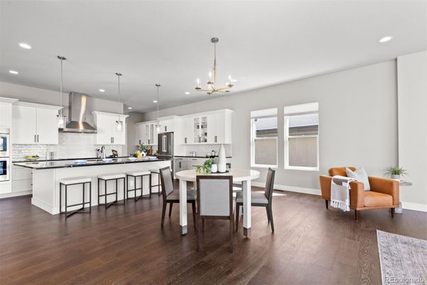 Dining room, Interior, Kitchen, Pendant Lights, Recessed Lighting, Stainless Steel Appliances, Wood Texture Flooring